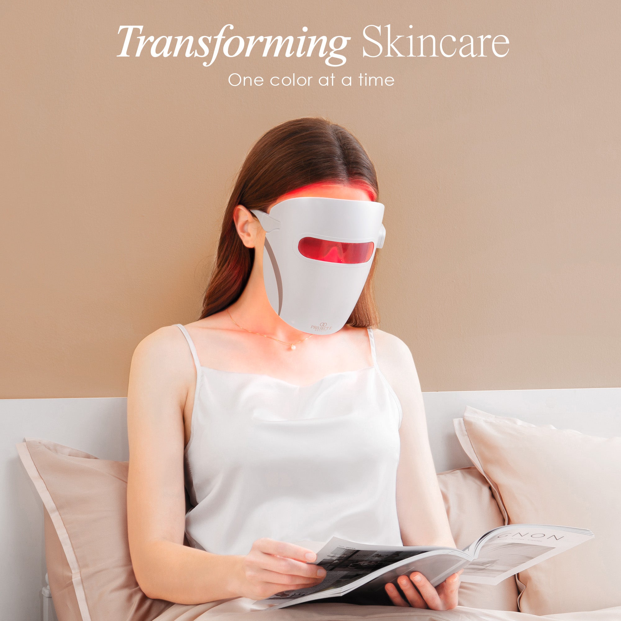 Lumamask 7 LED light therapy face mask showing a model wearing the mask